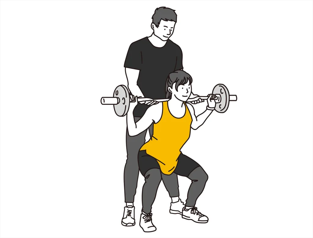 ジムのトレーナーと女性