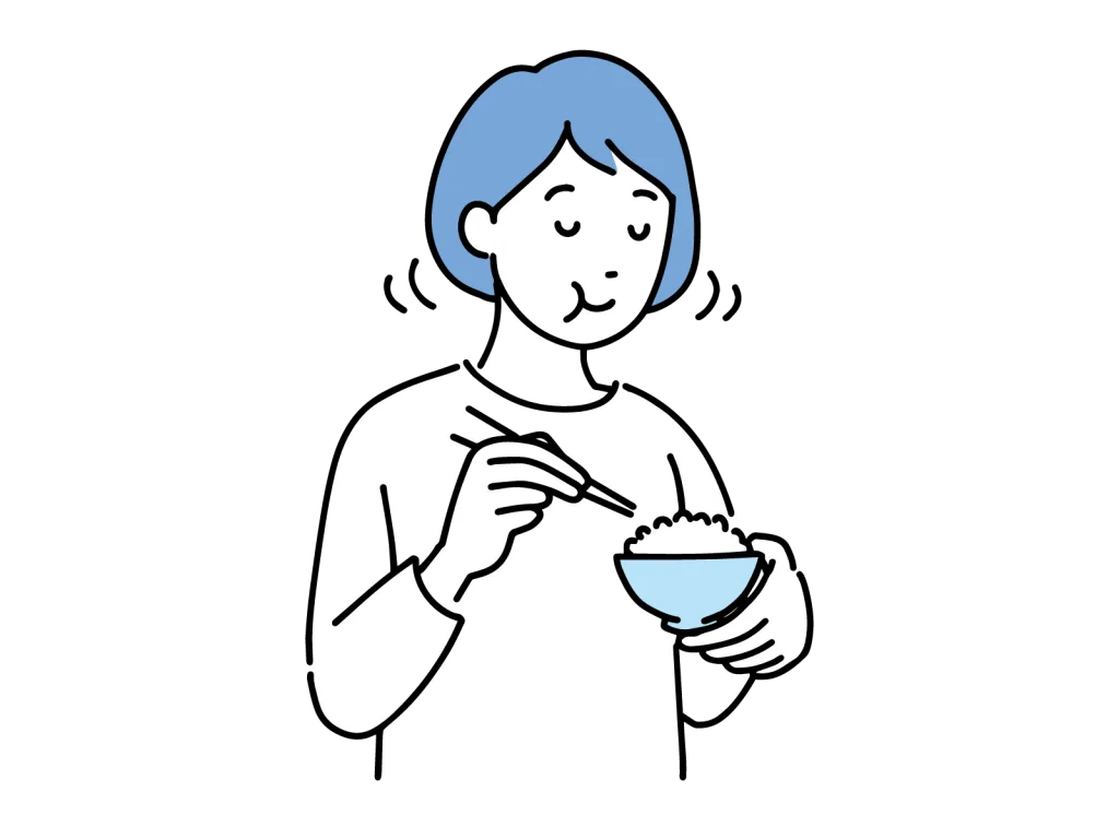 白米を食べる女性